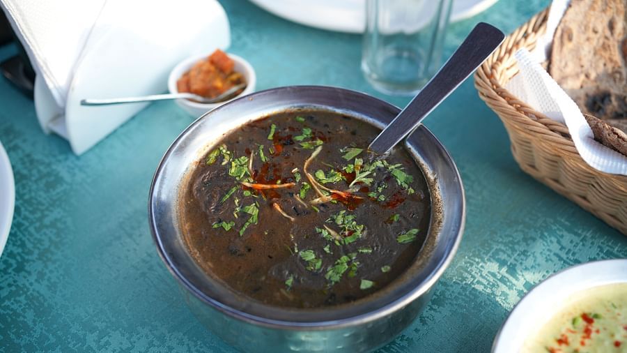 Sol Glow Resort, Nainital Nainital A thick indian gravy dish plated on a steel bowl, with a spoon